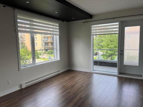 Living room - 208B-40 Rue Simon-Lussier, Blainville, QC - Indoor Photo Showing Other Room