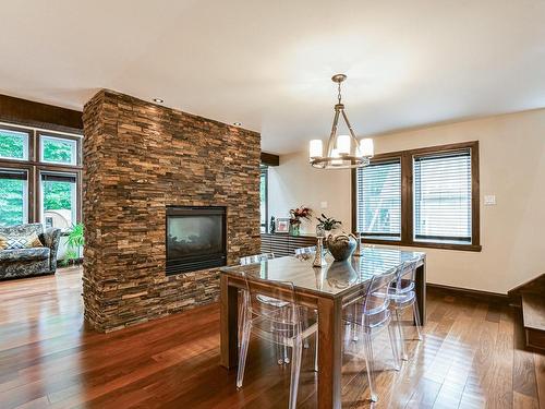 Dining room - 9 155E Avenue, Saint-Hippolyte, QC - Indoor With Fireplace