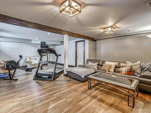 Family room - 9 155E Avenue, Saint-Hippolyte, QC - Indoor Photo Showing Gym Room