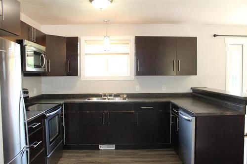 383 Birch Street, Arborg, MB - Indoor Photo Showing Kitchen With Double Sink