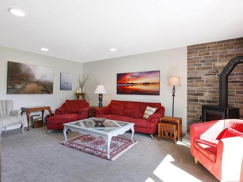 216-205 1St St, Courtenay, BC - Indoor Photo Showing Living Room With Fireplace