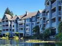 105-5650 Edgewater Lane, Nanaimo, BC  - Outdoor With Body Of Water With Facade 