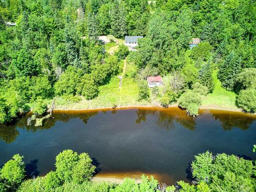 Photo aÃ©rienne - 166 Ch. De La Falaise, Piedmont, QC - Outdoor With Body Of Water