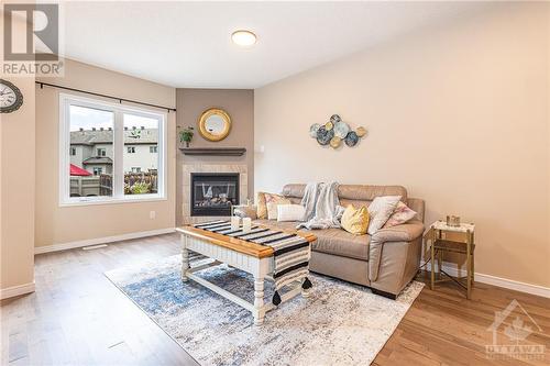609 Via Amalfi Street, Ottawa, ON - Indoor Photo Showing Living Room With Fireplace