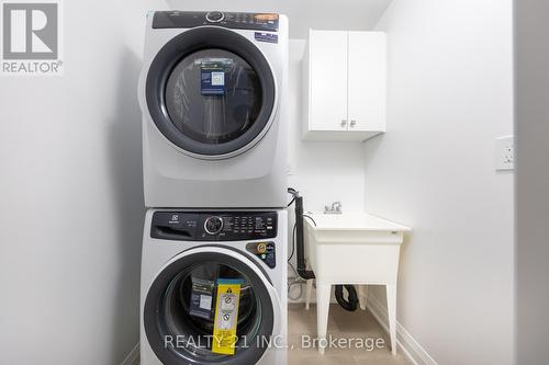 91 Chelliah Court, Toronto E11, ON - Indoor Photo Showing Laundry Room