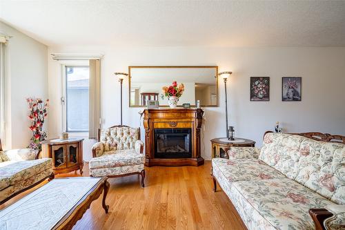 2076 Okanagan Street, Armstrong, BC - Indoor Photo Showing Living Room With Fireplace