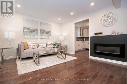 111 Palmerston Avenue, Whitby (Williamsburg), ON - Indoor Photo Showing Living Room With Fireplace