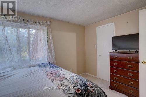 44 - 161 Wickson Trail E, Toronto E11, ON - Indoor Photo Showing Bedroom