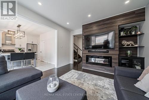 94 Borrelli Drive, Brampton, ON - Indoor Photo Showing Living Room With Fireplace