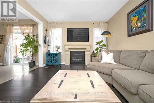 19 Humphrey Street, Hamilton, ON - Indoor Photo Showing Living Room With Fireplace