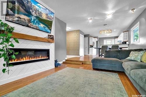 40 Tibbits Road, Regina, SK - Indoor Photo Showing Living Room With Fireplace