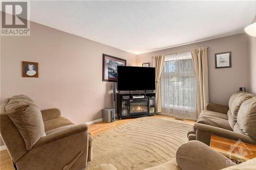 39 Rickey Place, Kanata, ON - Indoor Photo Showing Living Room With Fireplace