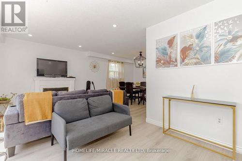 48 Gondola Crescent, Brampton, ON - Indoor Photo Showing Living Room With Fireplace