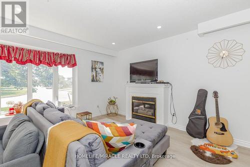 48 Gondola Crescent, Brampton, ON - Indoor Photo Showing Living Room With Fireplace