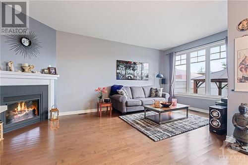 476 Rochefort Circle, Ottawa, ON - Indoor Photo Showing Living Room With Fireplace