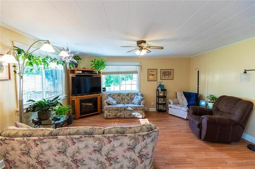 359 Birch Street, Arborg, MB - Indoor Photo Showing Living Room With Fireplace