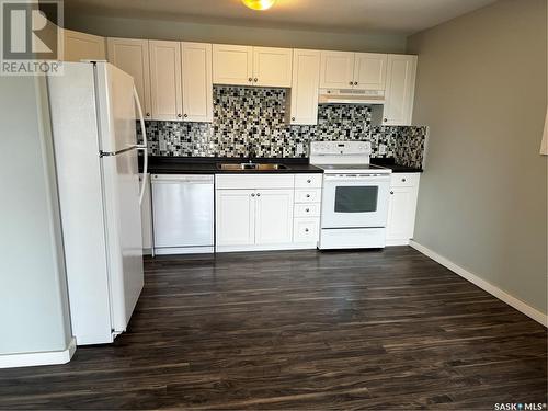 201 306 Perkins Street, Estevan, SK - Indoor Photo Showing Kitchen With Double Sink