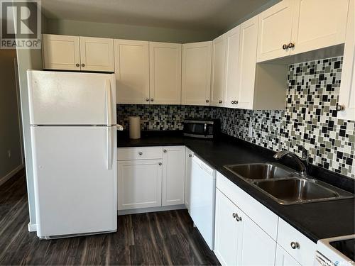 201 306 Perkins Street, Estevan, SK - Indoor Photo Showing Kitchen With Double Sink