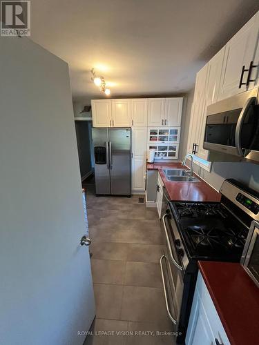 98 Flora Drive, Toronto E04, ON - Indoor Photo Showing Kitchen With Double Sink