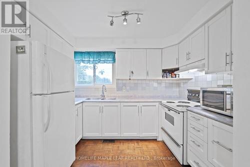 76 - 77 Collins Crescent, Brampton, ON - Indoor Photo Showing Kitchen With Double Sink