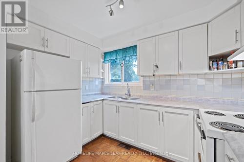 76 - 77 Collins Crescent, Brampton, ON - Indoor Photo Showing Kitchen With Double Sink