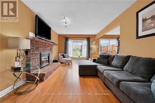 22 Tomahawk Drive, Grimsby, ON - Indoor Photo Showing Living Room With Fireplace