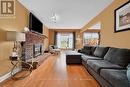 22 Tomahawk Drive, Grimsby, ON  - Indoor Photo Showing Living Room With Fireplace 