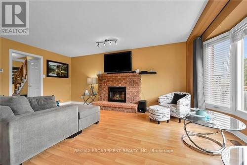 22 Tomahawk Drive, Grimsby, ON - Indoor Photo Showing Living Room With Fireplace