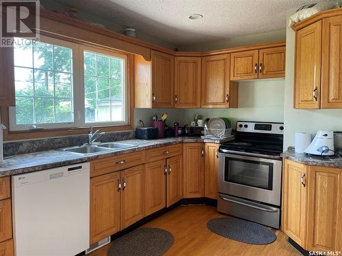 3709 29Th Avenue, Regina, SK - Indoor Photo Showing Kitchen With Double Sink