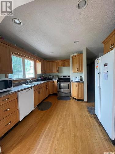 3709 29Th Avenue, Regina, SK - Indoor Photo Showing Kitchen With Double Sink