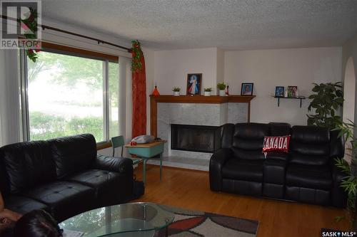 3709 29Th Avenue, Regina, SK - Indoor Photo Showing Living Room With Fireplace