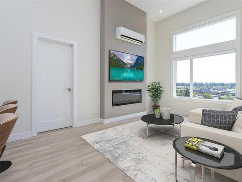 502-918 Jenkins Ave, Langford, BC - Indoor Photo Showing Living Room With Fireplace