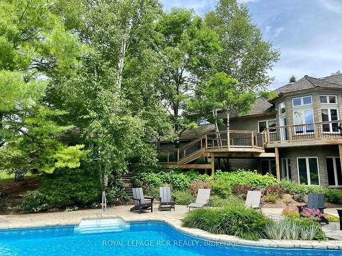 101089 10Th Sdrd, East Garafraxa, ON - Outdoor With In Ground Pool With Deck Patio Veranda With Backyard