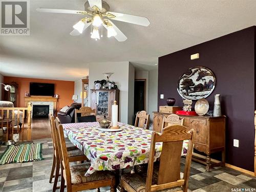 Keck Acreage, Gravelbourg, SK - Indoor Photo Showing Dining Room With Fireplace