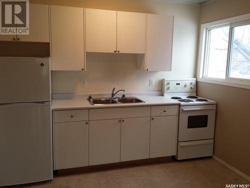 1686 Toronto Street, Regina, SK - Indoor Photo Showing Kitchen With Double Sink