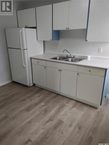 1686 Toronto Street, Regina, SK - Indoor Photo Showing Kitchen With Double Sink