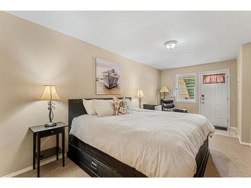 1222 - 1200 Riverside Way, Fernie, BC - Indoor Photo Showing Bedroom