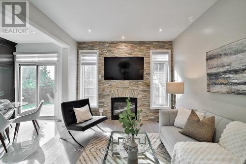 1251 Laurier Avenue, Milton (Clarke), ON - Indoor Photo Showing Living Room With Fireplace