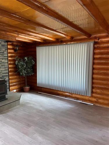 Swan River, Manitoba - Indoor Photo Showing Other Room With Fireplace