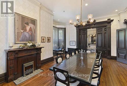 1205 - 28 Linden Street, Toronto C08, ON - Indoor Photo Showing Dining Room With Fireplace