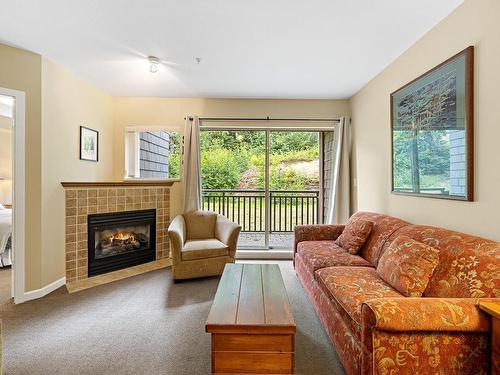 108-1280 Alpine Rd, Courtenay, BC - Indoor Photo Showing Living Room With Fireplace