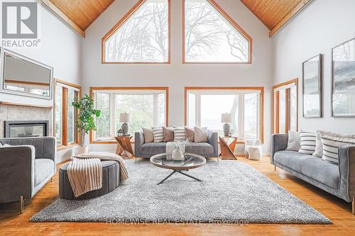 128 Moores Beach Road, Georgina (Virginia), ON - Indoor Photo Showing Living Room With Fireplace