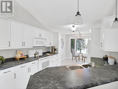 36 Sea Breeze Drive, Norfolk (Port Dover), ON - Indoor Photo Showing Kitchen With Double Sink