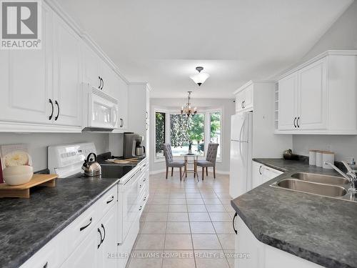 36 Sea Breeze Drive, Norfolk (Port Dover), ON - Indoor Photo Showing Kitchen With Double Sink