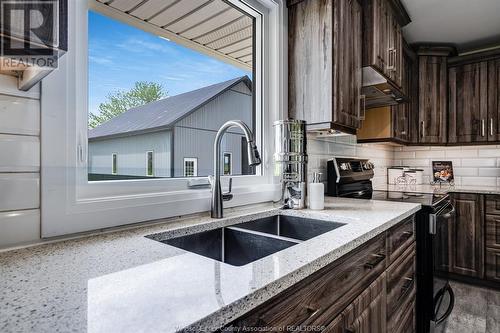 1910 County Road 8, Wheatley, ON - Indoor Photo Showing Kitchen With Double Sink