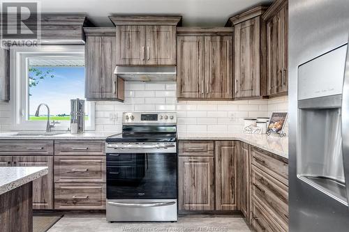 1910 County Road 8, Wheatley, ON - Indoor Photo Showing Kitchen With Upgraded Kitchen