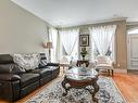 Salon - 7655 Rue Liege, Brossard, QC  - Indoor Photo Showing Living Room 