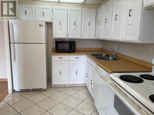 #1506 - 3590 Kaneff Crescent, Mississauga, ON - Indoor Photo Showing Kitchen With Double Sink