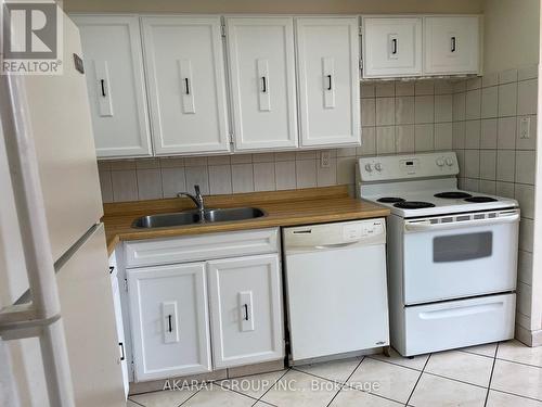 #1506 - 3590 Kaneff Crescent, Mississauga, ON - Indoor Photo Showing Kitchen With Double Sink