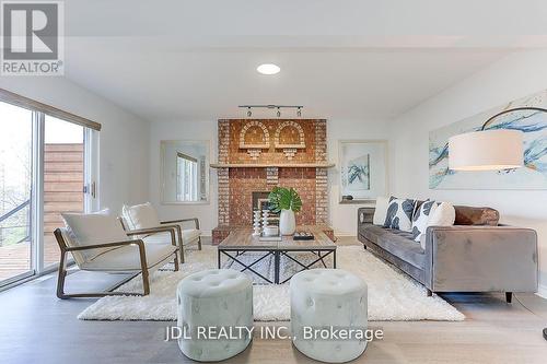 49 Druan Drive, Kawartha Lakes, ON - Indoor Photo Showing Living Room With Fireplace